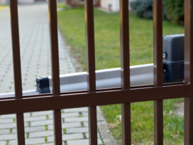 Shiny Brown coloured Automatic gate with Gate opener installed perfectly to enhance security