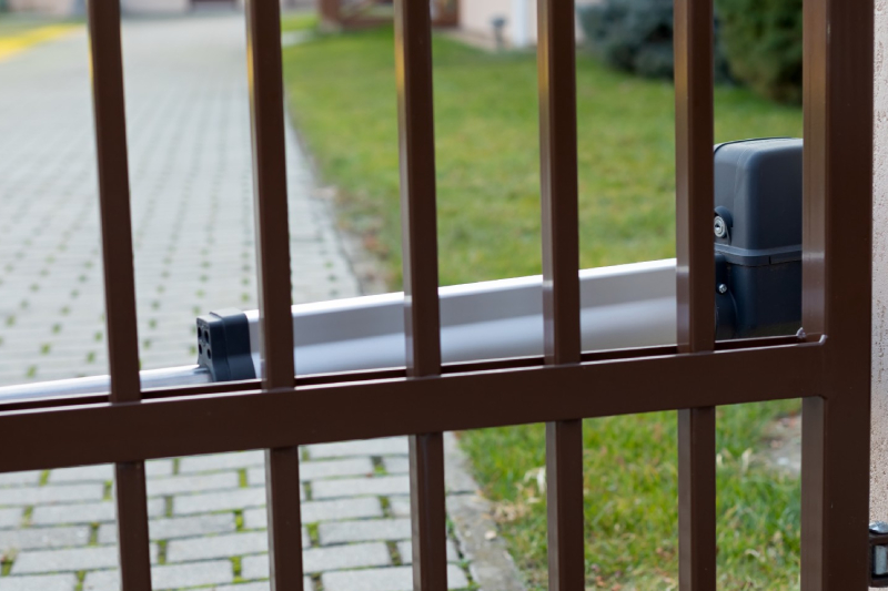 Shiny Brown coloured Automatic gate with Gate opener installed perfectly to enhance security