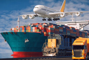 Shipment of goods loaded in the cargo containers can be in the sea port, an air craft on the sky along with a truck can be seen in the picture.